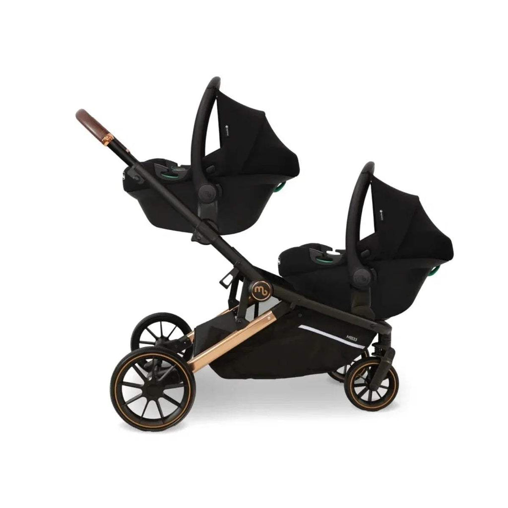 Twin stroller travel system, black seats with canopies on black frame
