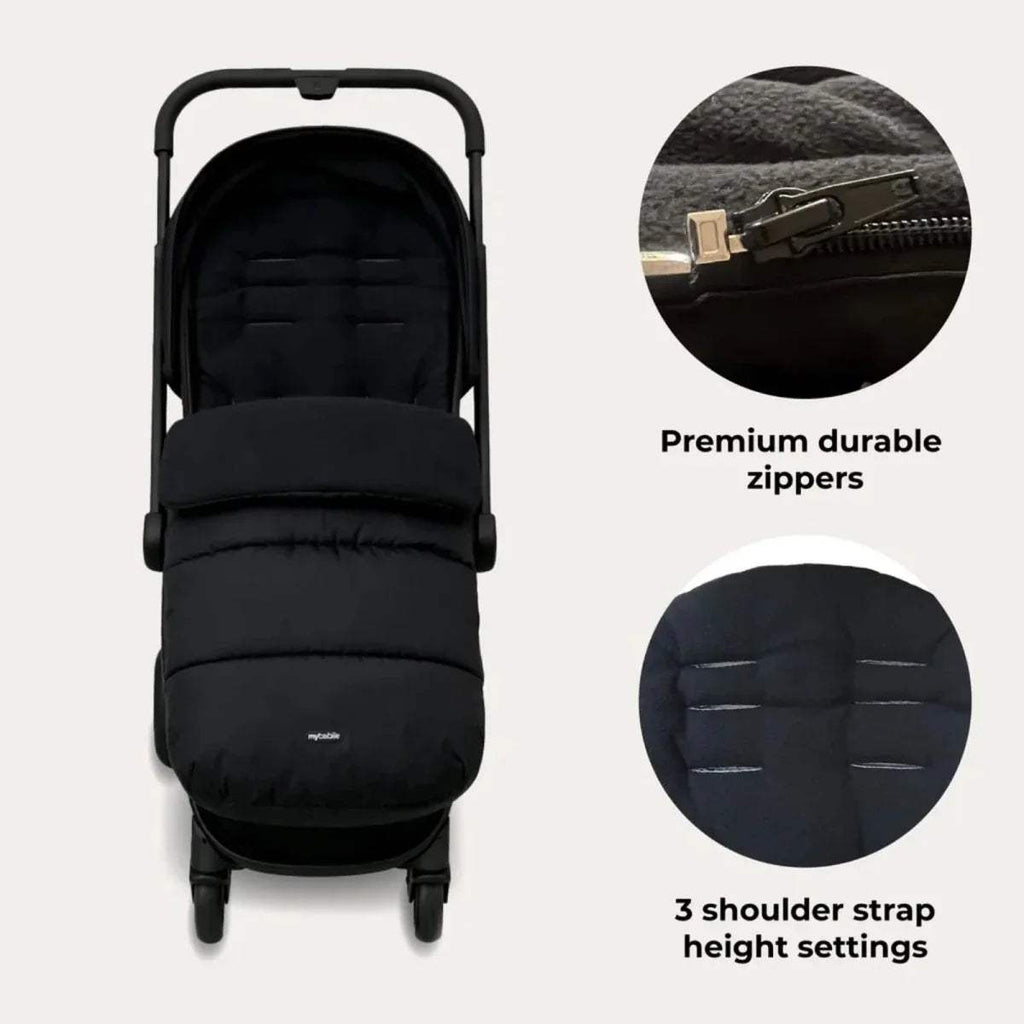 Black padded stroller seat with zipper detail and carry handle