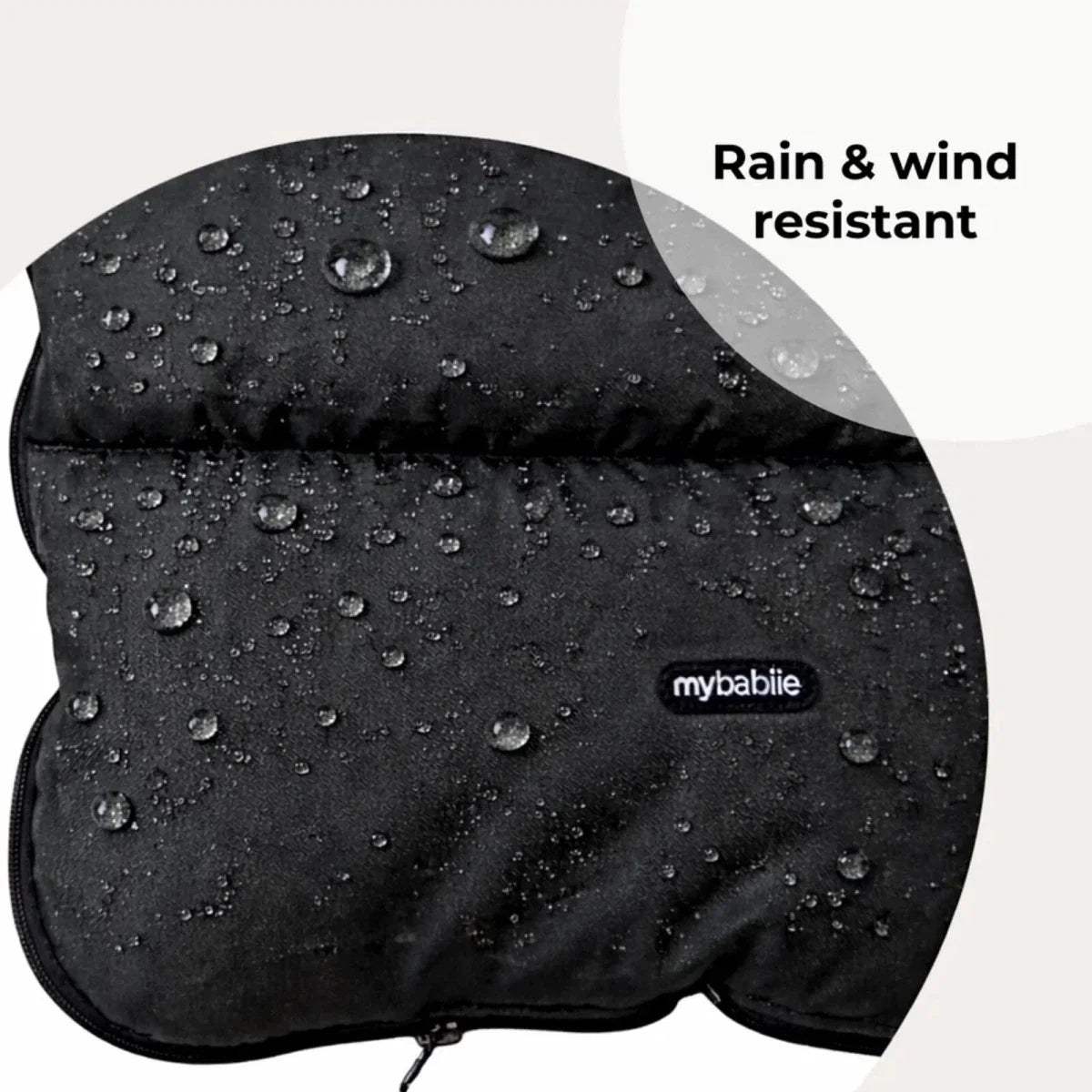 Black water-resistant padded seat cover with droplets and mybabiiie logo
