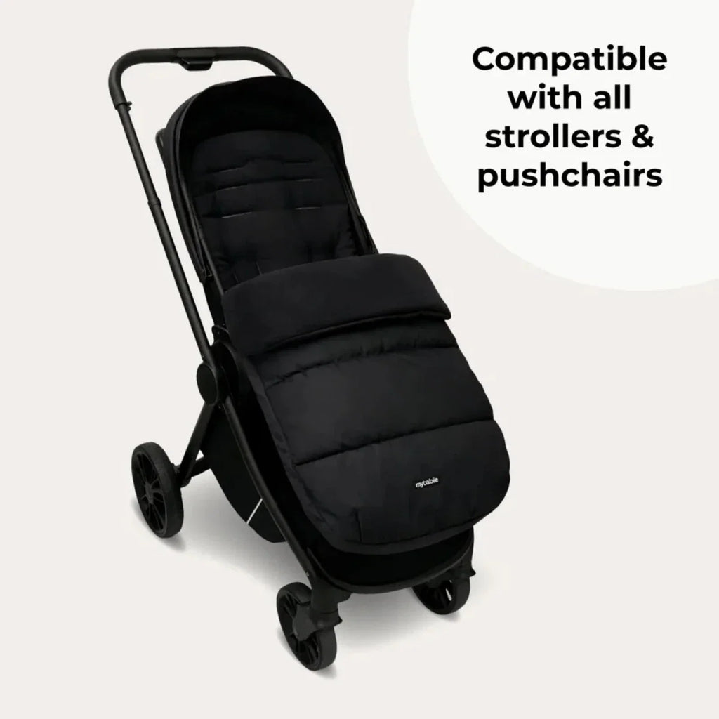 Dark padded stroller seat cover fitted on a pushchair