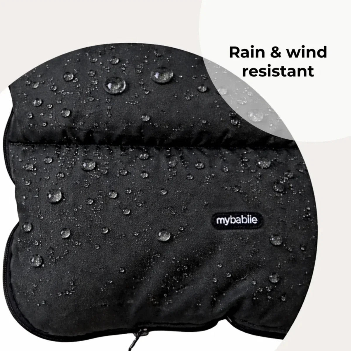 Dark water-repellent stroller seat cover with droplets and mybabie logo