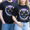 Black unisex T-shirt with large purple and gold cat face graphic, crew neck
