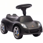 Matte black ride-on push car with front headlights, steering wheel, and molded seat