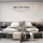 High-gloss black floating bedside tables mounted on wall next to bed