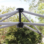 Gazebo canopy corner joint with black center pole and bolt-connected frame supports