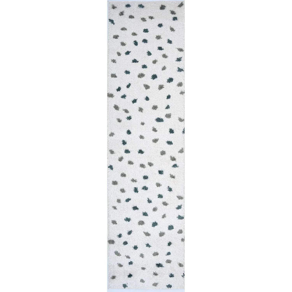 Rectangular shaggy rug sample with white background and dark green micro dot print.
