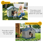 Grey dog house with blue roof and paw-print emblem in garden; pet and owner nearby