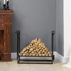 Black steel firewood log rack with stacked firewood logs