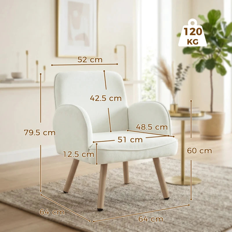 Cream velvet armchair side view with rounded back, padded seat cushion, and wooden legs