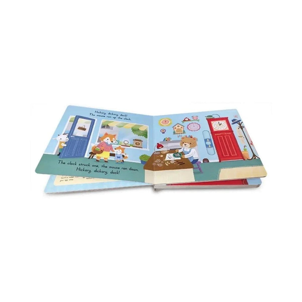 Sing-along board book open pages with animal house scene and lyrics text
