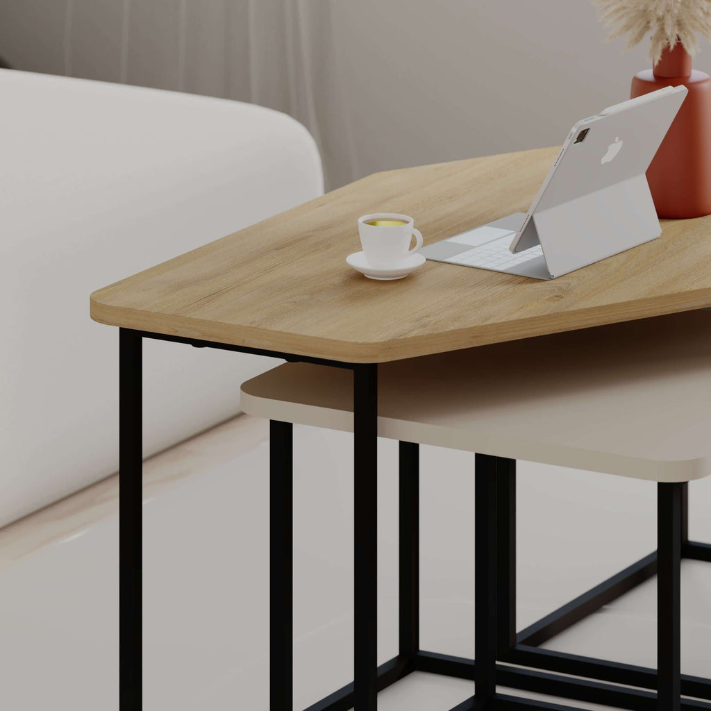 Square light-wood coffee table with black metal legs and lower shelf, angled close view