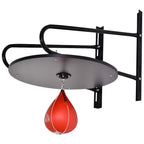 Wall-mounted speed ball platform with black frame, gray circular base, and red hanging bag