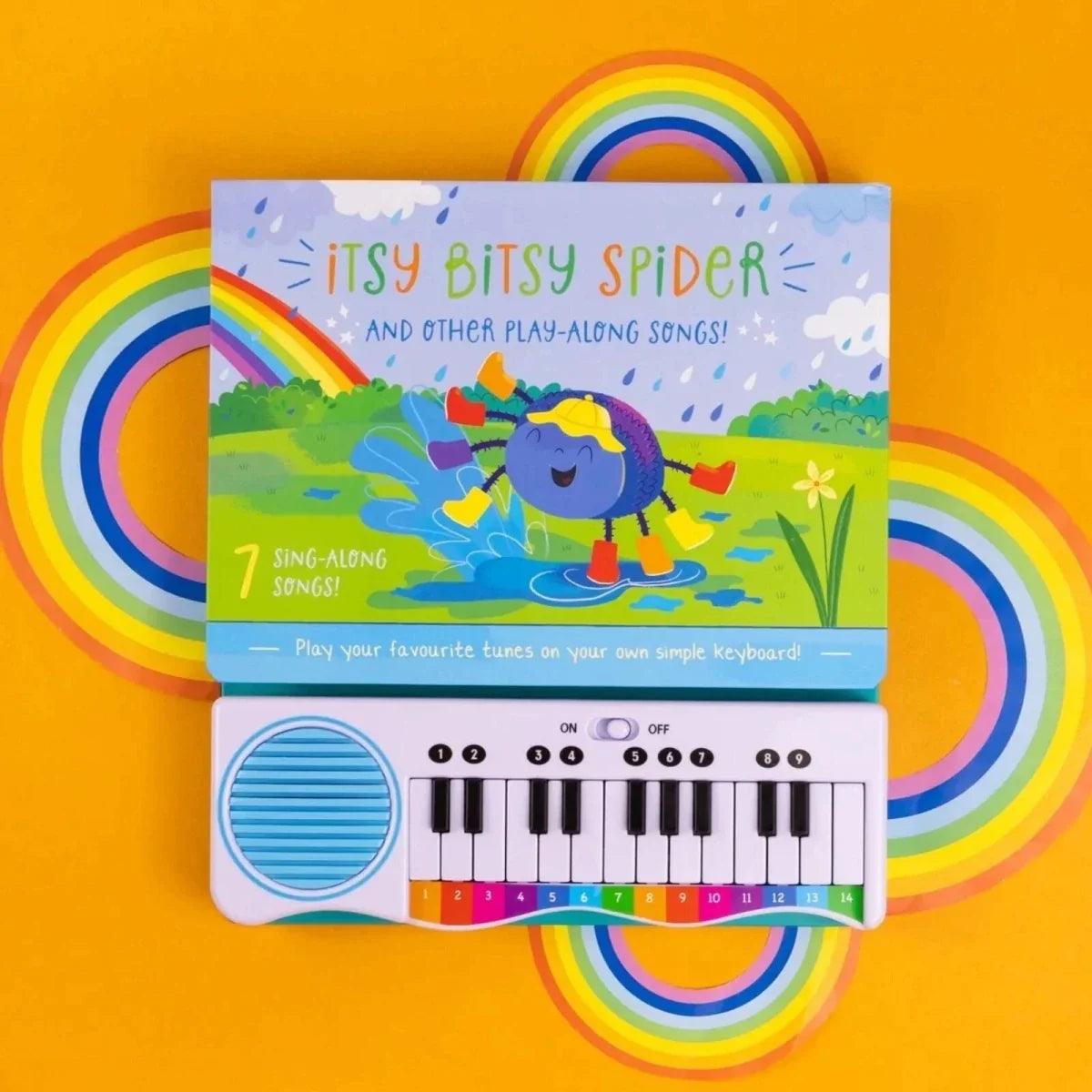 Front musical piano book featuring Itsy Bitsy Spider artwork and built-in mini keyboard