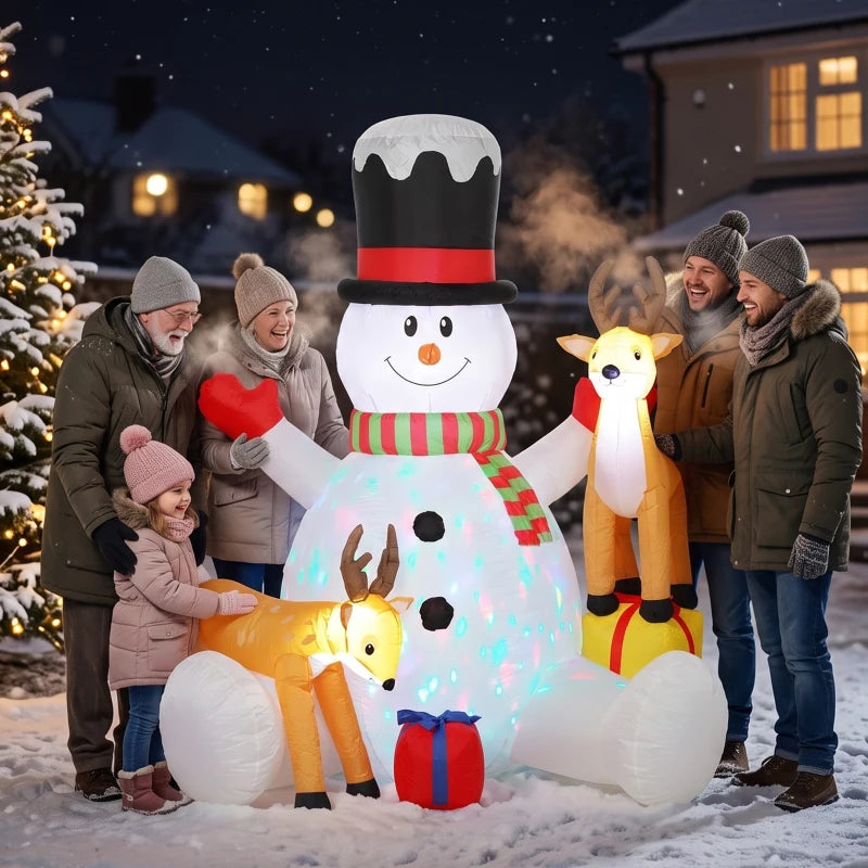 LED inflatable snowman with red hat and striped scarf, with two reindeer decorations