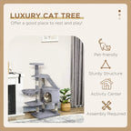 Grey cat tree activity center with multiple resting areas, perches, and enclosed cubby