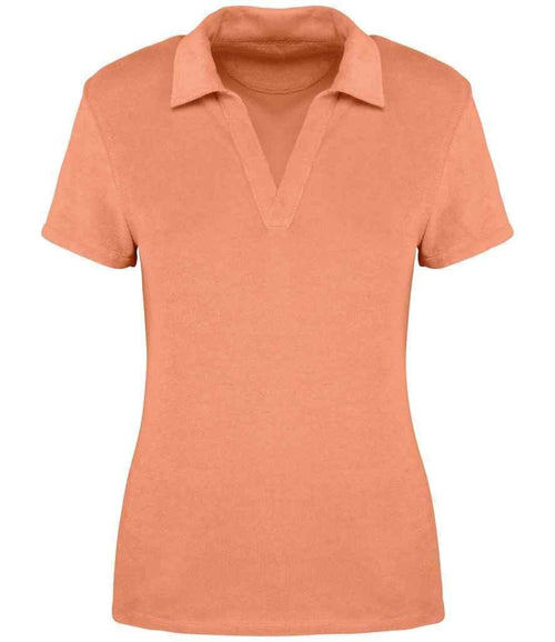 Apricot women’s towel-feel polo shirt with short sleeves and V-neck placket