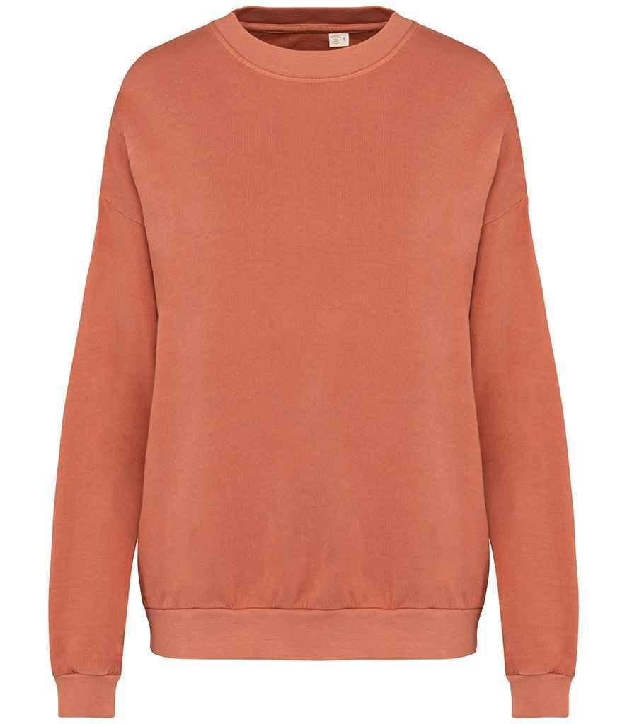 Rust orange oversized French terry sweatshirt with crew neck and long sleeves