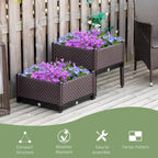 Two brown raised garden planters with diamond-pattern texture holding flowering plants