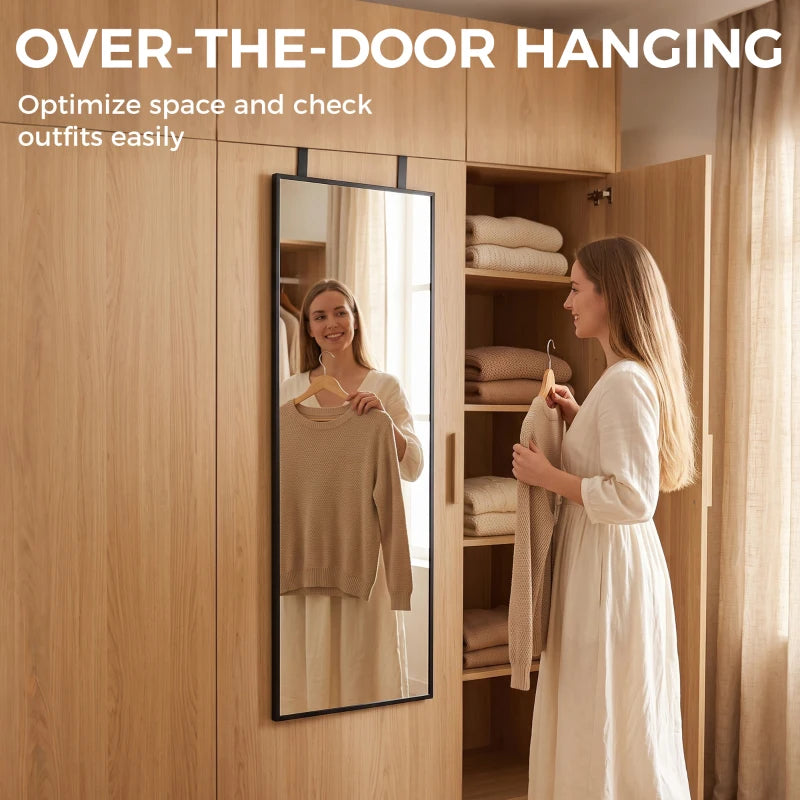 Black full-length rectangular mirror hanging over a door
