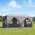 Dark grey pop-up gazebo canopy with sidewalls installed in a backyard