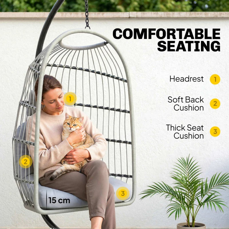 Light grey egg chair with wire frame and thick padded headrest and seat cushions
