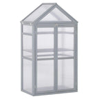Grey polycarbonate cold frame greenhouse with double doors and slanted roof