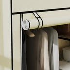 Cream fabric closet interior with rolled hanging rod and hanging garments