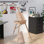 Wooden standing art easel on tripod legs with adjustable tilting drawing board
