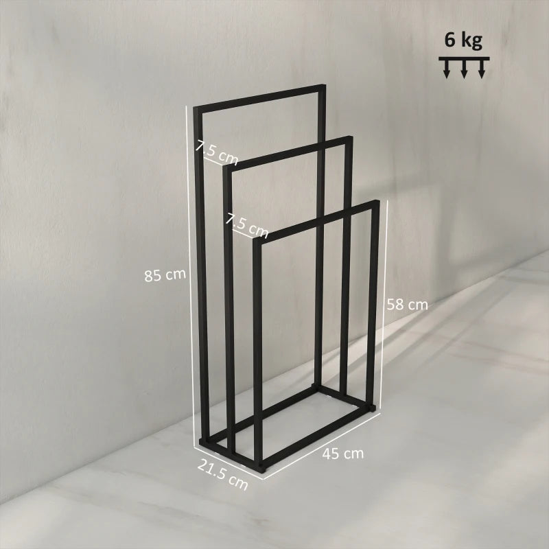 Black freestanding towel rack with three bars, side view of open frame.