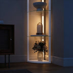 White LED floor lamp with glass shelves and warm light glow, front view