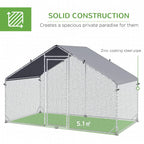 Galvanized wire chicken coop with enclosed run area and dark gray top cover