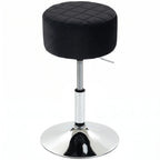 Black round padded bar stool seat with quilted top and chrome base