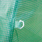 Close-up of green mesh greenhouse cover with white tie fastener