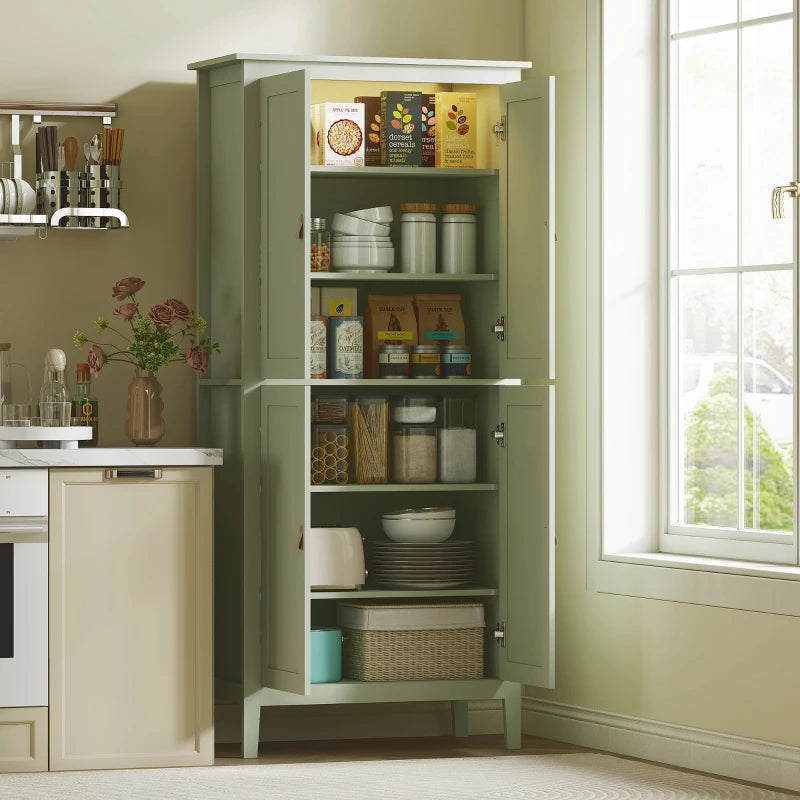 Green tall pantry cupboard in kitchen, doors open with shelves holding pantry jars and dishes.