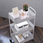 White three-tier storage trolley with mesh shelves and rolling casters