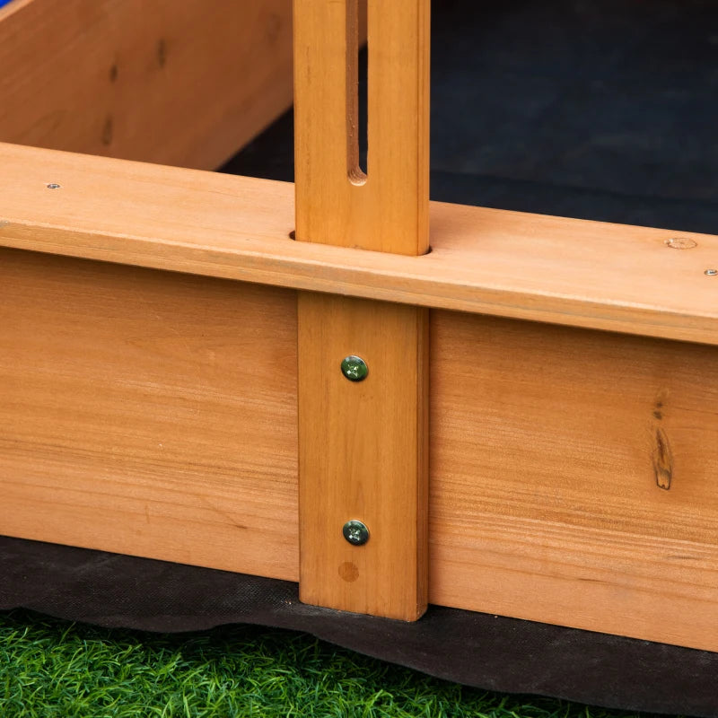 Wooden kids sandbox corner joint with green screws and vertical support post