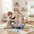 Rocket wooden activity cube with bead maze and gears, child pushing pieces