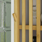 Close-up of bamboo slatted cabinet door panel with handle detail on a white frame