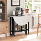 White marble drop-leaf folding table with open shelf, black frame, caster wheels