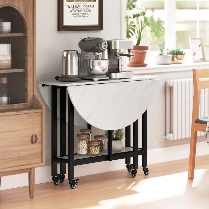 White marble drop-leaf folding table with open shelf, black frame, caster wheels