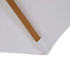 Cream parasol canopy corner with tucked fabric and wooden support bar