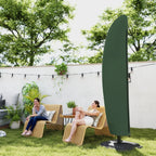 Green cantilever umbrella cover on freestanding base in outdoor garden setting