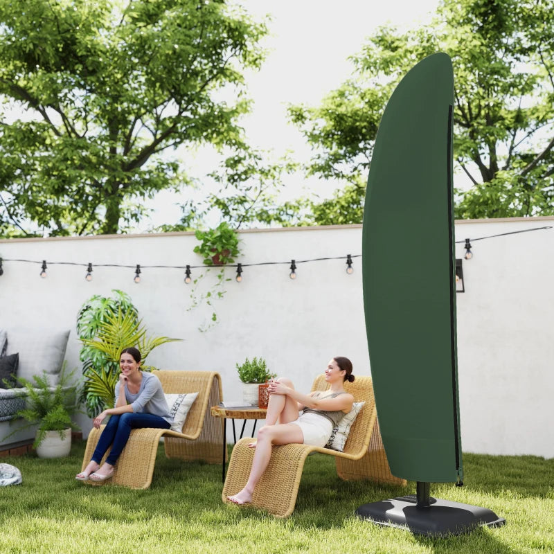 Green cantilever umbrella cover on freestanding base in outdoor garden setting