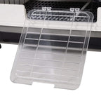 Clear plastic slide-out tray for three-tier metal hutch, designed for the bottom grate