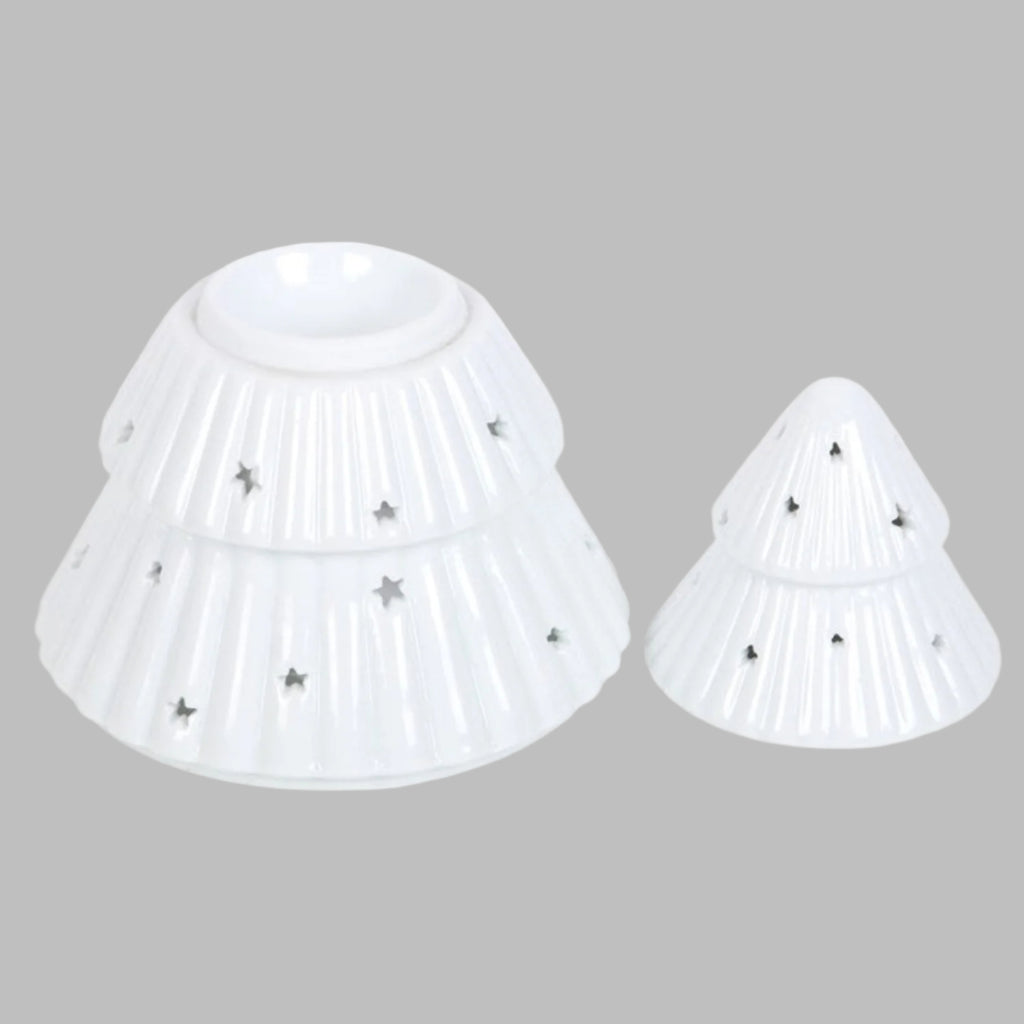 Two white plastic cones with star-shaped holes on a white background