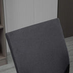 Dark grey upholstered office chair backrest with textured fabric