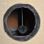 Close-up of oval dark plush cat cave inside beige sisal scratching barrel