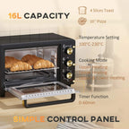 Black countertop oven with open door and gold control panel knobs