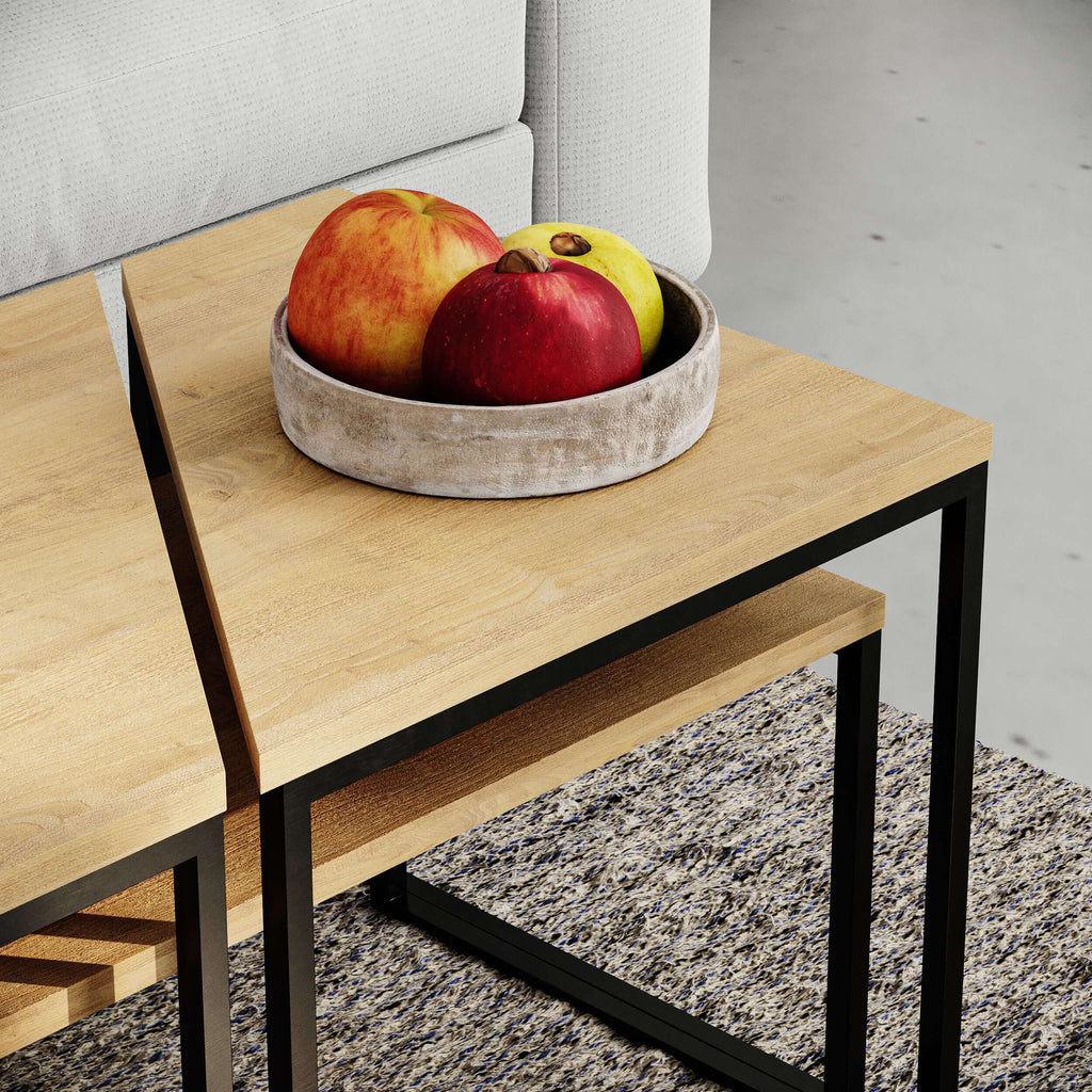 Oak wood top modern coffee table with black metal frame and fruit on top