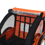Close-up of orange and black bike trailer mesh seat, transparent window, and side frame